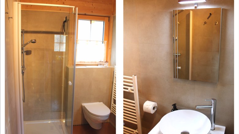 Modernes Badezimmer mit Dusche, WC, Waschbecken und Spiegel.