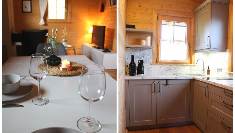 Gem&uuml;tliche K&uuml;che und Essbereich in einem Holzhaus mit moderner Einrichtung und warmem Licht.